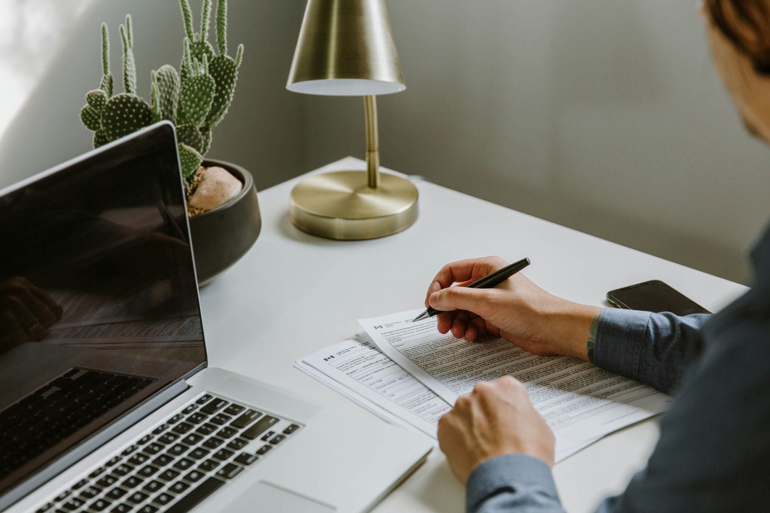 woman completing CRA form woman completing CRA form